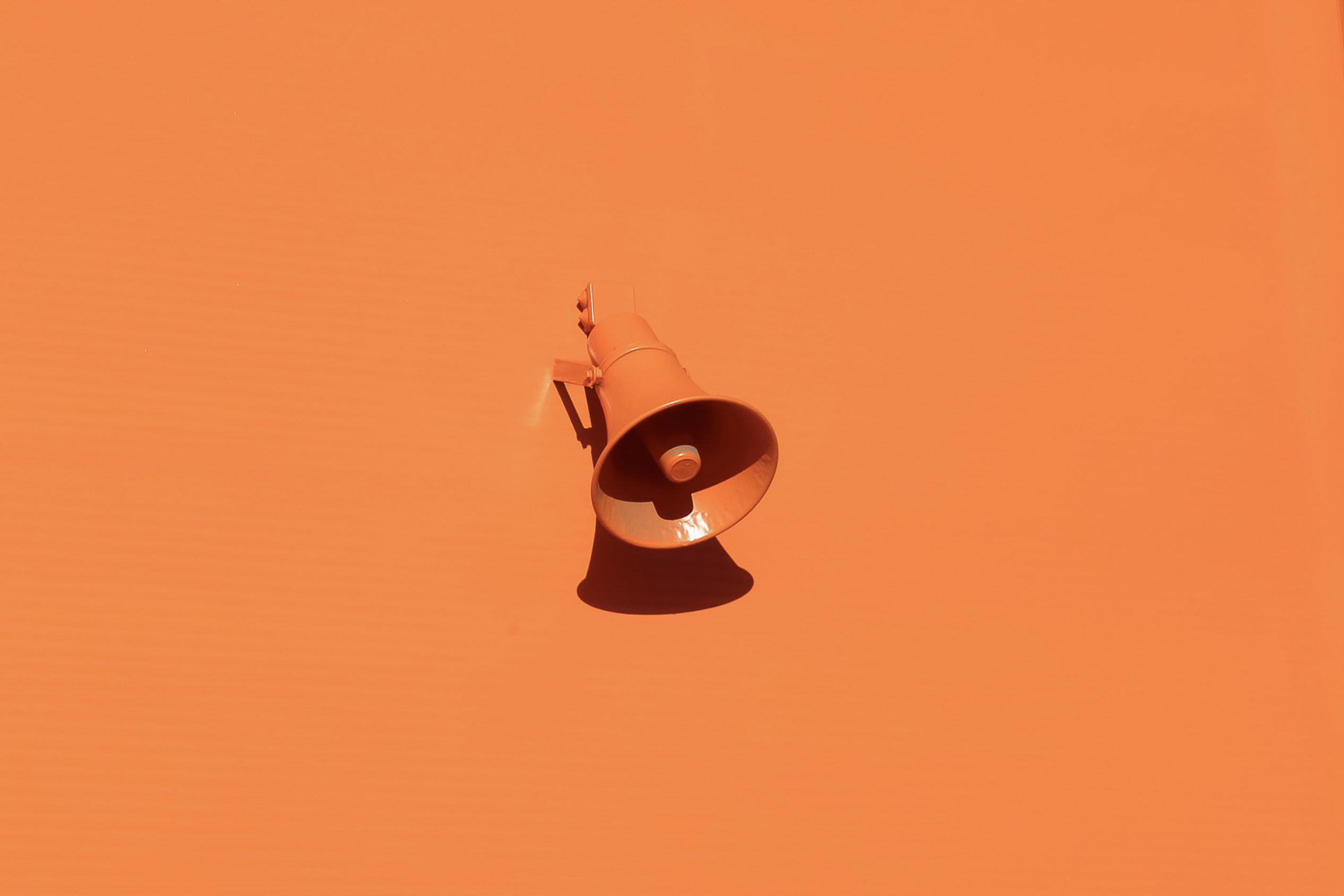 orange background, orange microphone